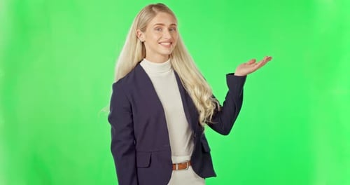 Business woman, pointing and product placement on green screen for advertising against a studio