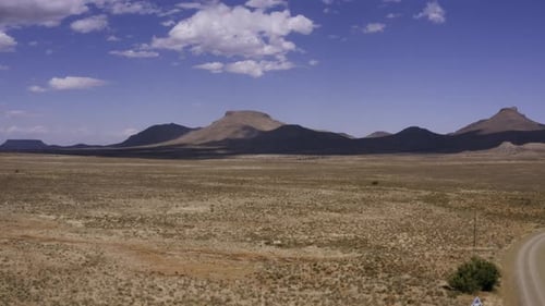 Aerial Karoo desert landscape, slow takeoff 4K