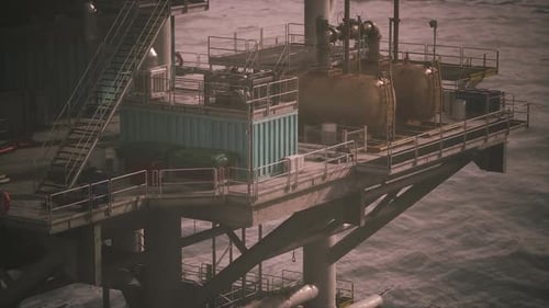 Intricate Machinery and Infrastructure of an Offshore Oil Rig are Showcased