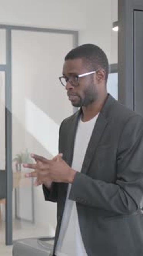 Man Talking in Modern Office Space