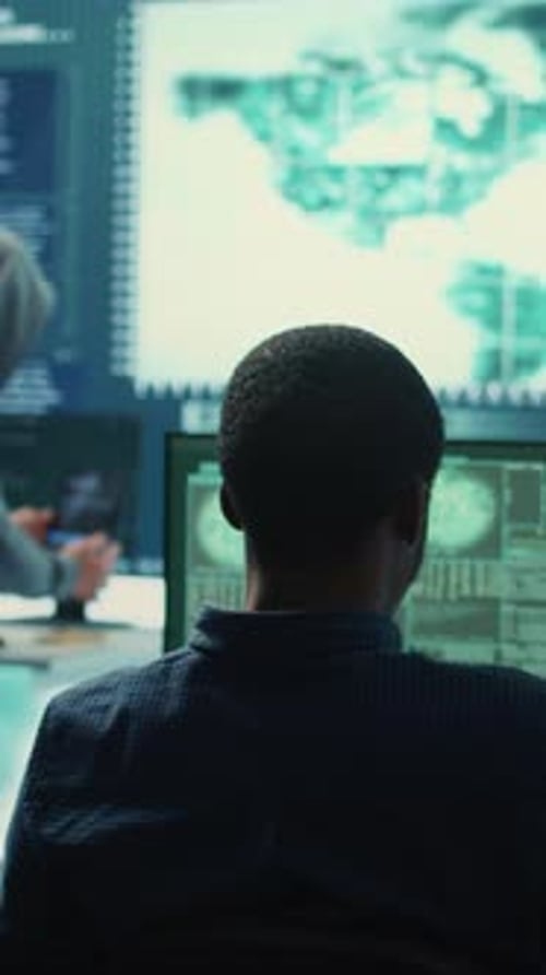 Cybersecurity Team Working in Modern Tech Office