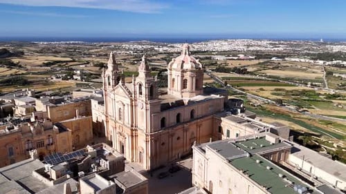 Drone shot of Metropolitan Cathedral of Saint Paul in Mdina, Malta