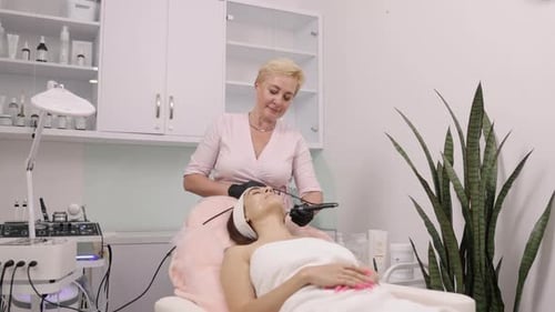 Woman receiving cosmetic treatment at a beauty spa