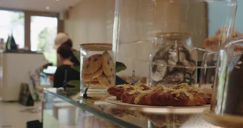 Different Sweet Bakery Pastry and Biscuits in Storage Container at Showcase