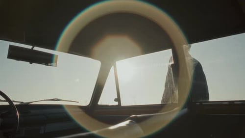 Loving Couple Leaving Car and Standing Outside during Stop on Road Trip