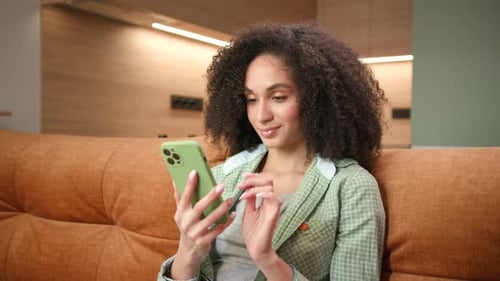 Woman Shows Green Screen on Smartphone at Camera African American Female Holding Mobile Phone Chroma