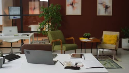 Interior of Modern Office, White Work Desk with Laptop