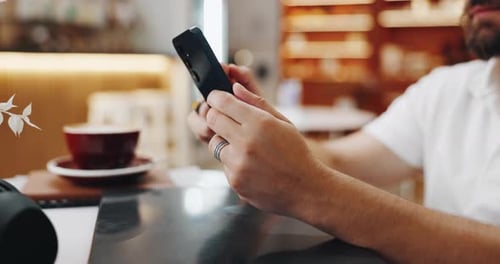 Phone, hands and search with man in cafe for networking, social media post and lunch break
