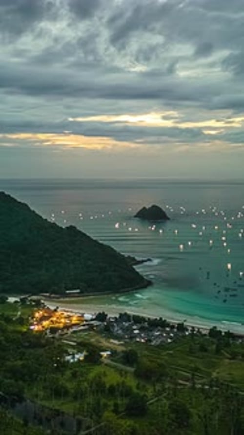 Natural daylight dimming into blue shade dusk over tropical paradise