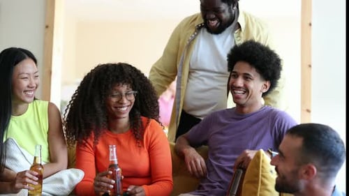 Friends Relaxing on Couch with Beverages