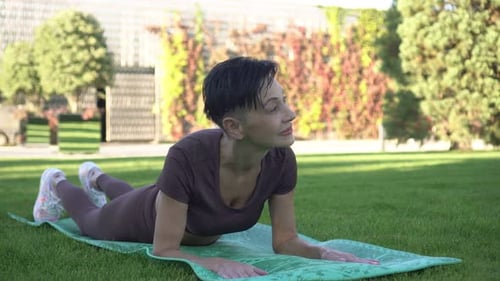 Elderly Woman Doing Sports Outdoors Training and Fitness in the Park and Active Lifestyle