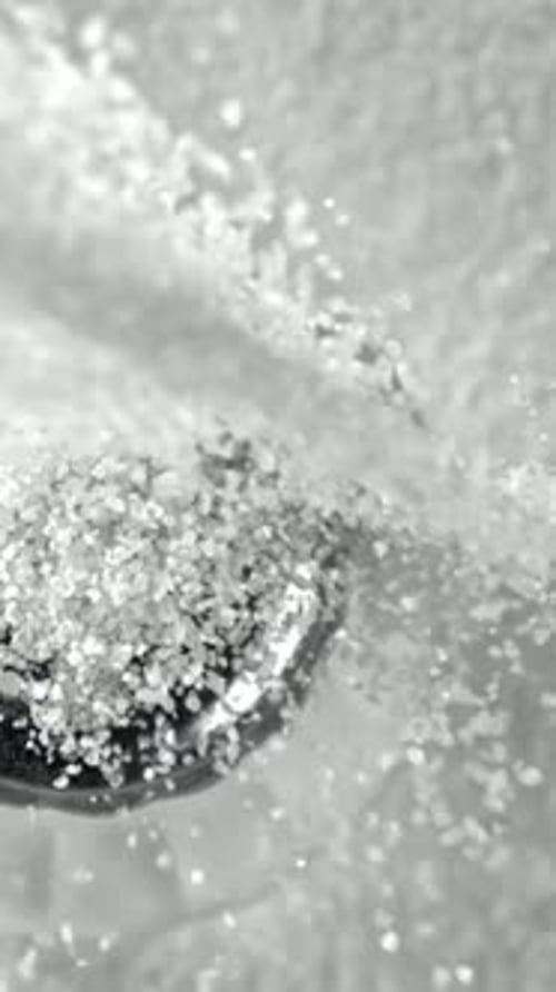 Salt Falls on the Salt Shaker Filmed on a Highspeed Camera at 1000 Fps
