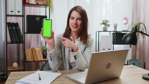 Business Woman Holding Smartphone with Green Screen Chroma Key Mock Up Recommend Good Application