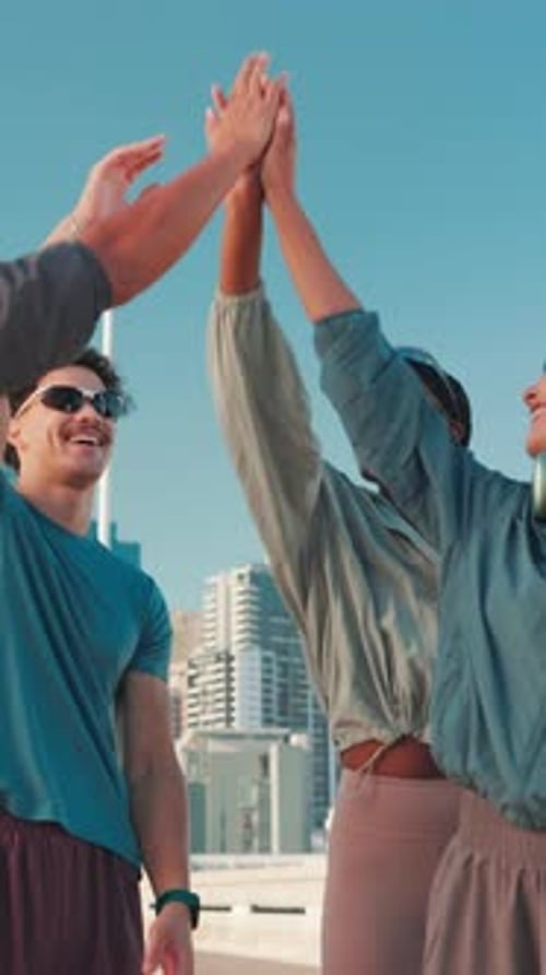 High five, running and friends in city for exercise, marathon training and cardio workout