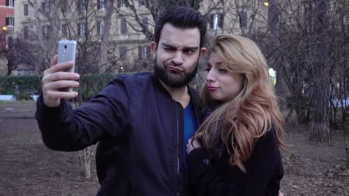 Romantic Couple Taking Selfie in Urban Park