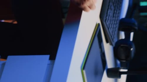 Man Editing Video on Digital Tablet