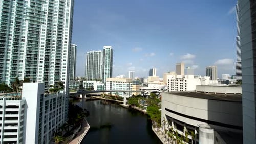 Downtown Miami skyscrapers rise above biscayne bay in stunning aerial drone view