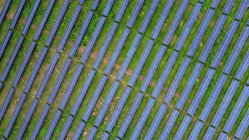 Solar Farm. Renewable Energy With Photovoltaic Panels. aerial top-down orbit