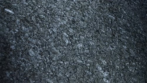 Movimiento suave de cámara con textura de piedra oscura