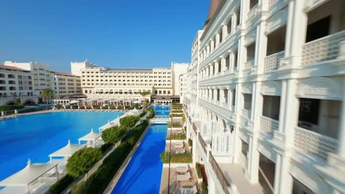 Aerial view of Swimming pool in the resort at Antalya. aerial view of luxury hotel with exotic pool