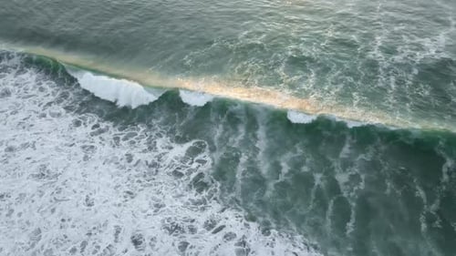 Aerial Drone View Over Atlantic Ocean with Beautiful Waves Pattern and Sea Foam Landscapes View of
