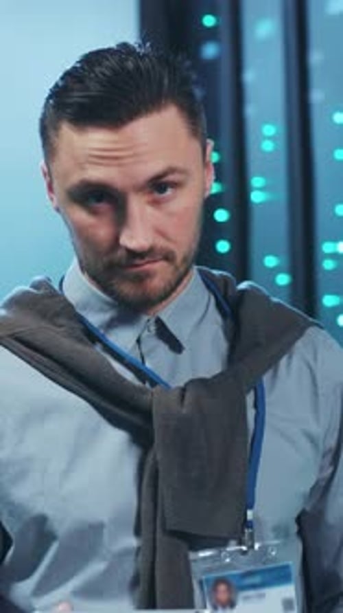 Man Holding Tablet in Data Center