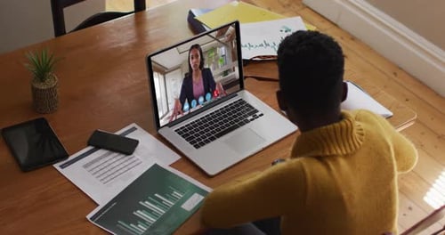 Young Adult on Video Call in Home Office
