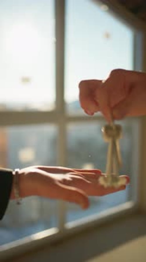 Closeup of Getting the Keys to the Apartment