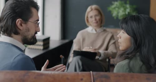 Couple in Therapy Session Talking with Counselor