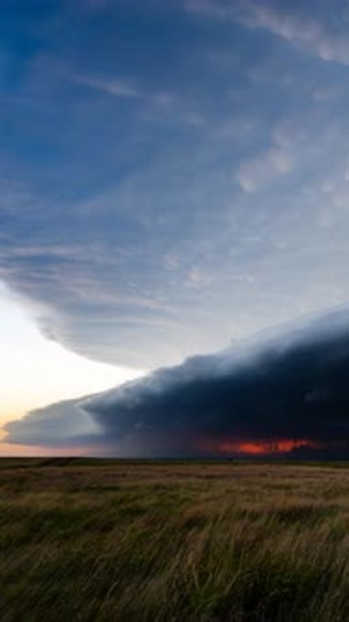 Dramatic Sunset Storm Over Rural Grassy Plains