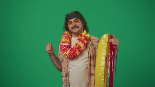 Man in Hawaiian Shirt with Pool Tube