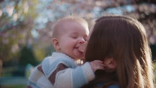 Mother Providing Nurturing Care For Her Child