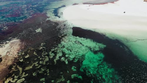 Aerial view of serene ocean and coastline at daytime