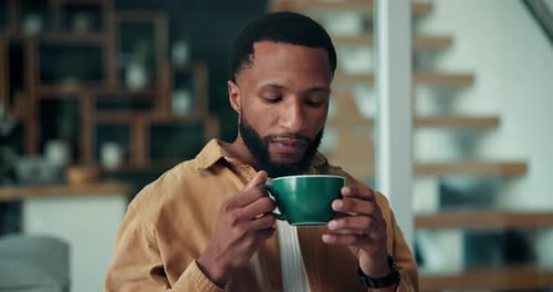 Man Enjoying a Quiet Moment with Coffee