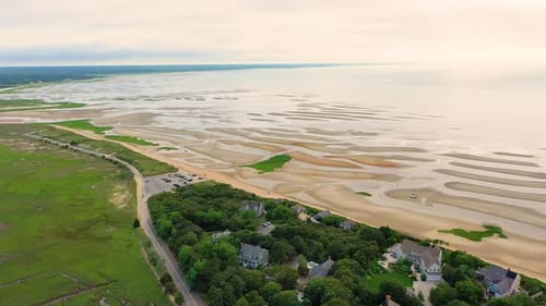 Cape Cod Public Beach with Tide Pools, Sand Ridges, and Coastal Homes