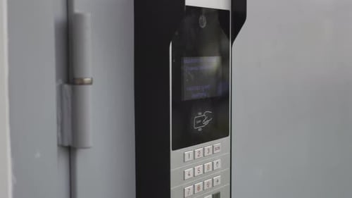 Apartment Building Intercom Device on Wall
