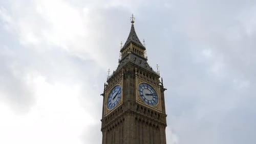 Low Angle Shot of Big Ben Clock Tower Against Cloudy Sky.