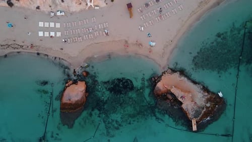 Aerial drone top shot of Cala Tarida, Ibiza cala Tarida