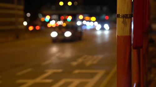Blurred Background Traffic Lights Of Moving Vehicles At Night In The City