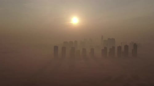 A new town in the haze where the sun rises.
