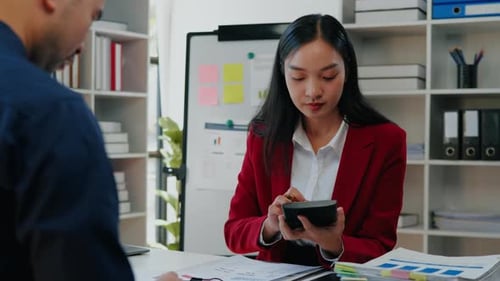 Financial Data Discussion in Bright Workplace