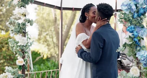 Loving Couple Exchange Vows at Outdoor Wedding Ceremony