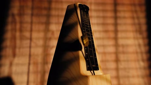 Old Wooden Metronome Rapidly Ticking