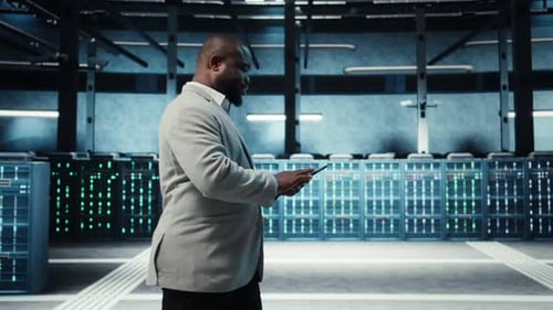 Data Center Engineer Adjusting Blade Server Hardware