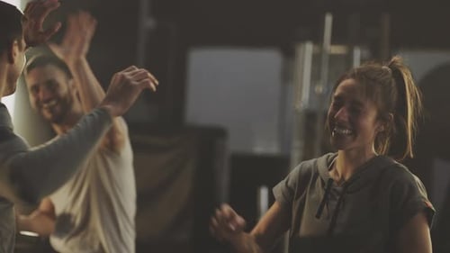 Group of people riding stationary bike