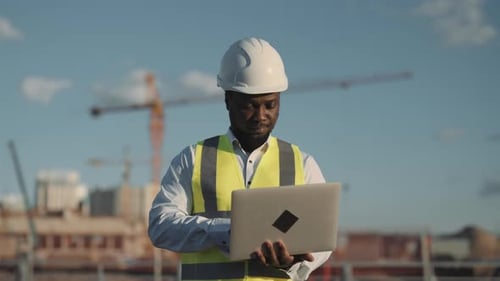 Innovation and Technology of Modern Building Professional Engineer with Laptop Highskilled Foreman