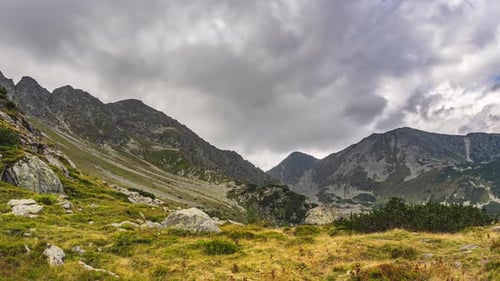 Dramatic Stormy Clouds Moving over Alps Mountains in Autumn Nature Time Lapse