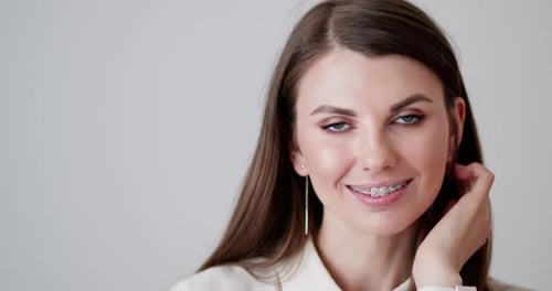 Attractive Woman Smiling Wearing Braces