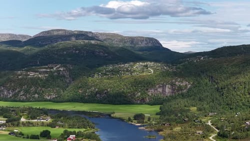 Aerial View of a Picturesque Norwegian Valley Landscape with Mountains