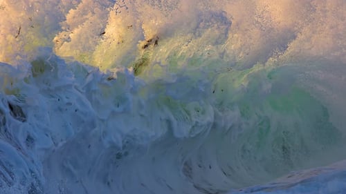Ocean waves at Sunset in slow motion